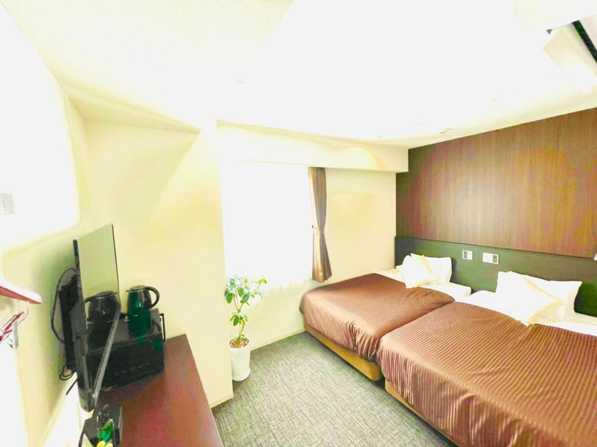 Natural Hot Spring Hotel Livemax Premium Хиросима Экстерьер фото